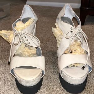 Cream platforms with laces.